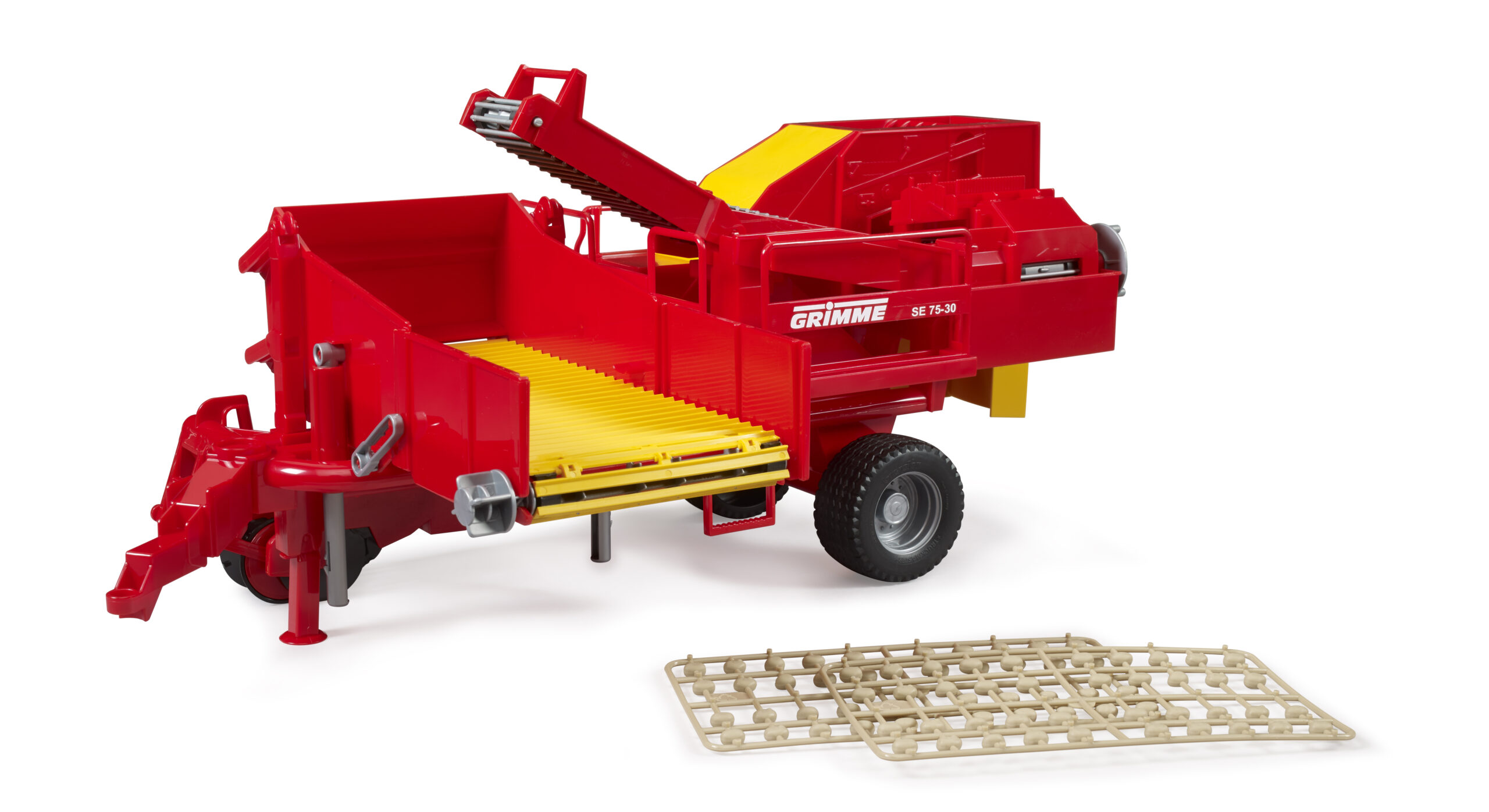 Grimme SE 75-30 potato digger with potatoes-imitations